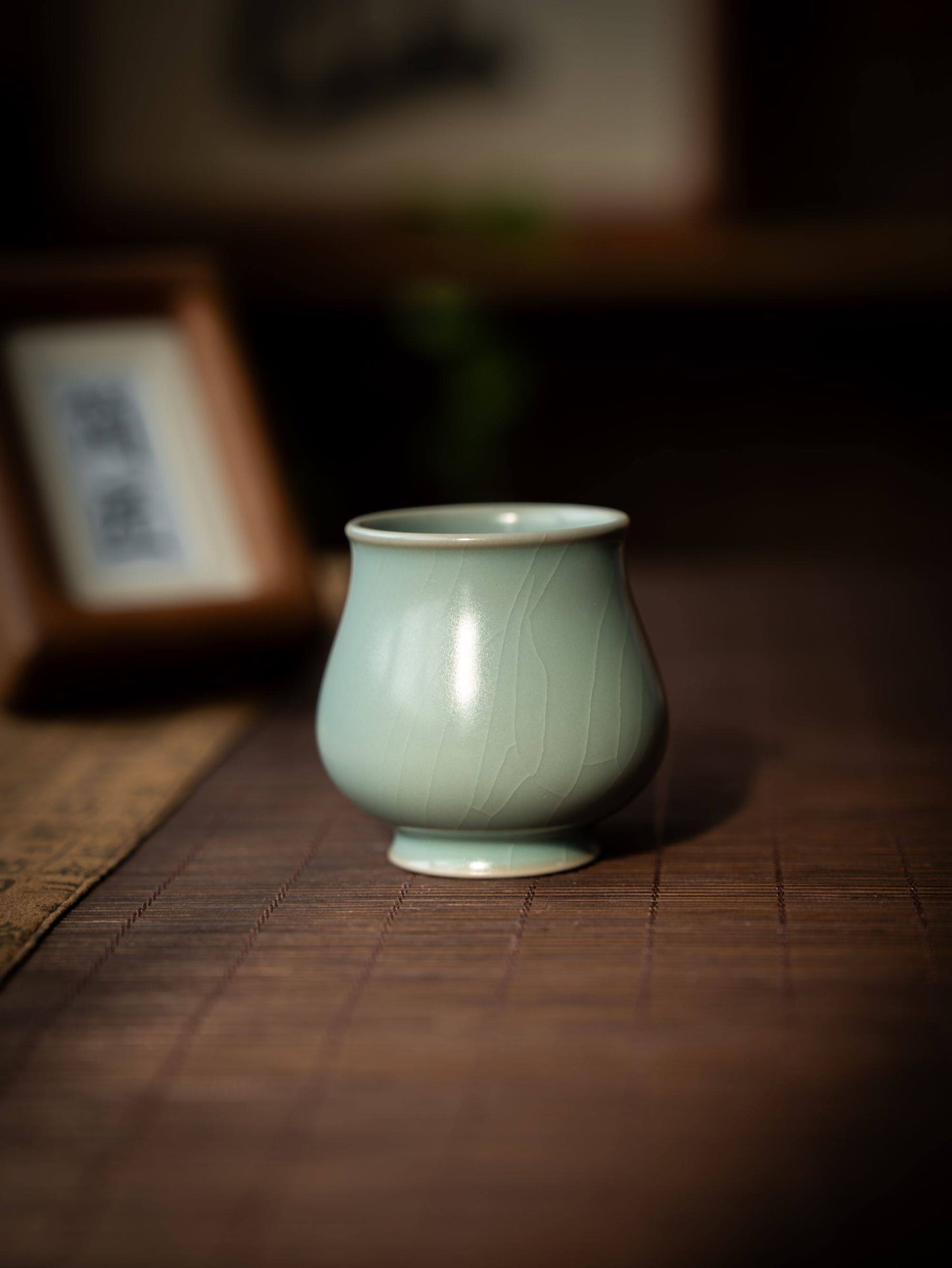 Jade-like texture and soft luster of an authentic 80ml Ru kiln tasting cup.