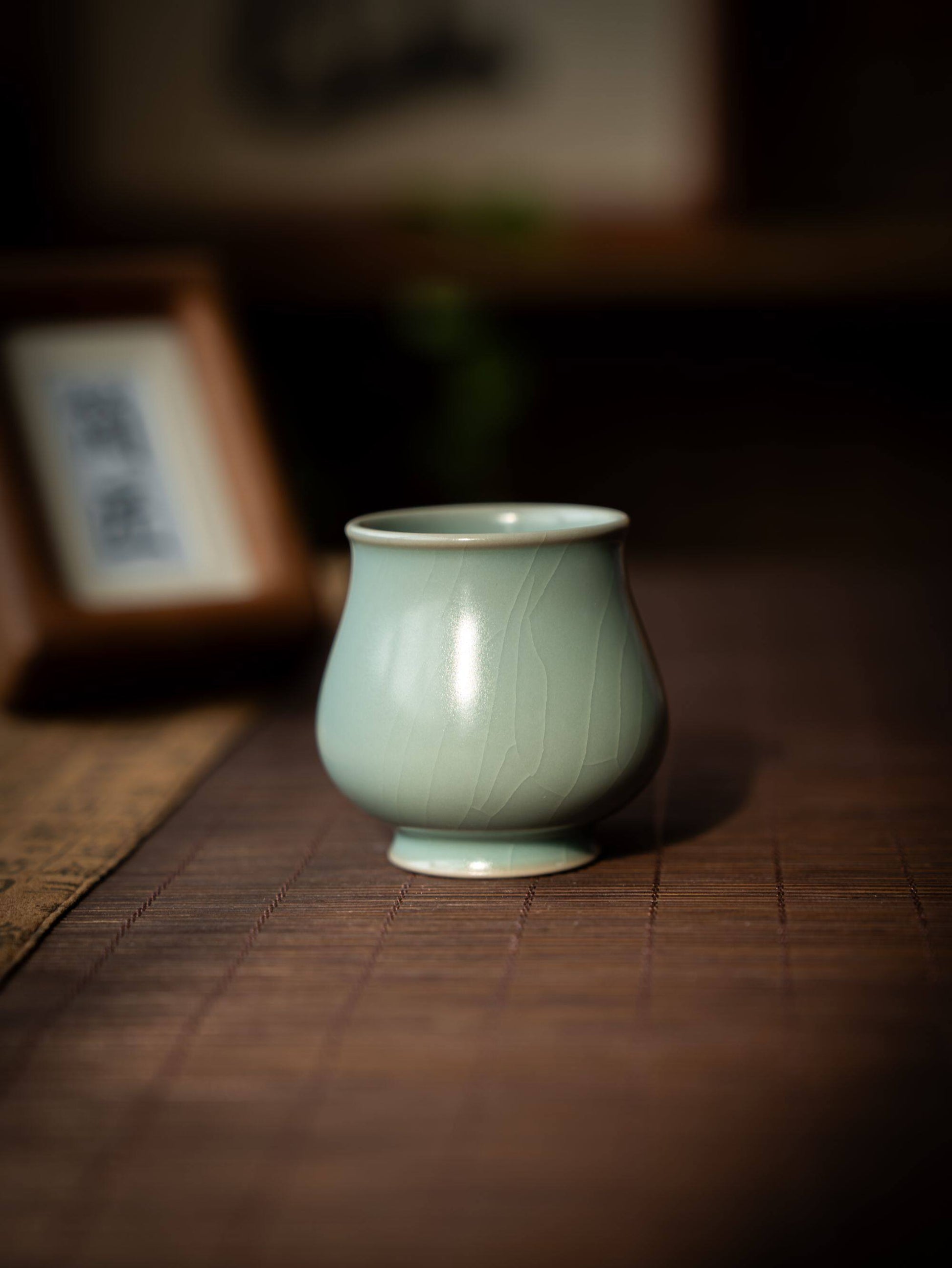 Jade-like texture and soft luster of an authentic 80ml Ru kiln tasting cup.