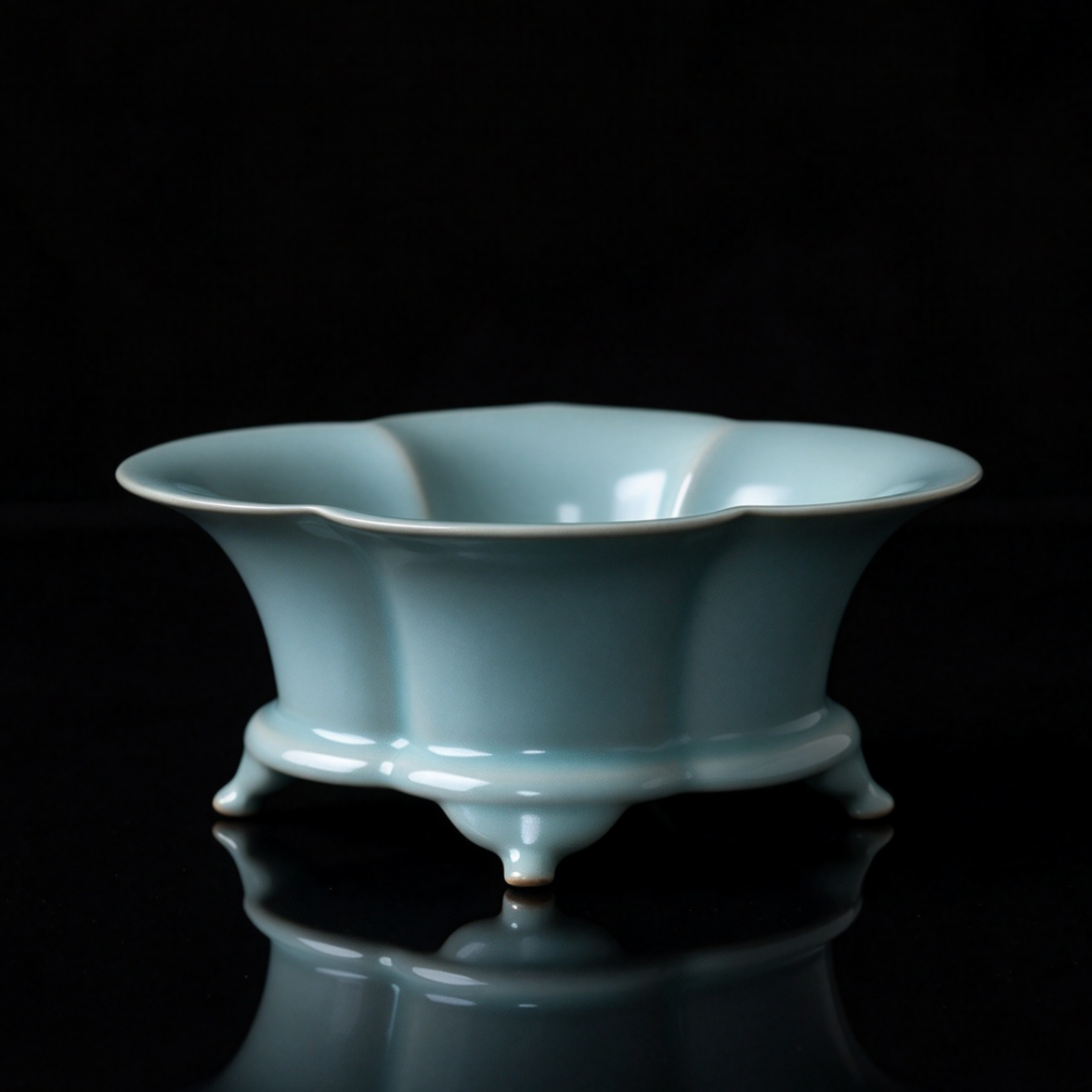 Handcrafted Ru Ware sky blue foliated basin used as fruit bowl and tea wastewater vessel on wooden table
