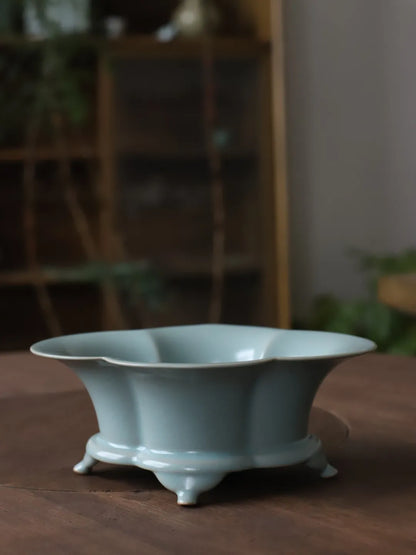 Close-up of Ru Ware basin flared rim showing soft sky blue glaze ideal for serving fruits and tea snacks