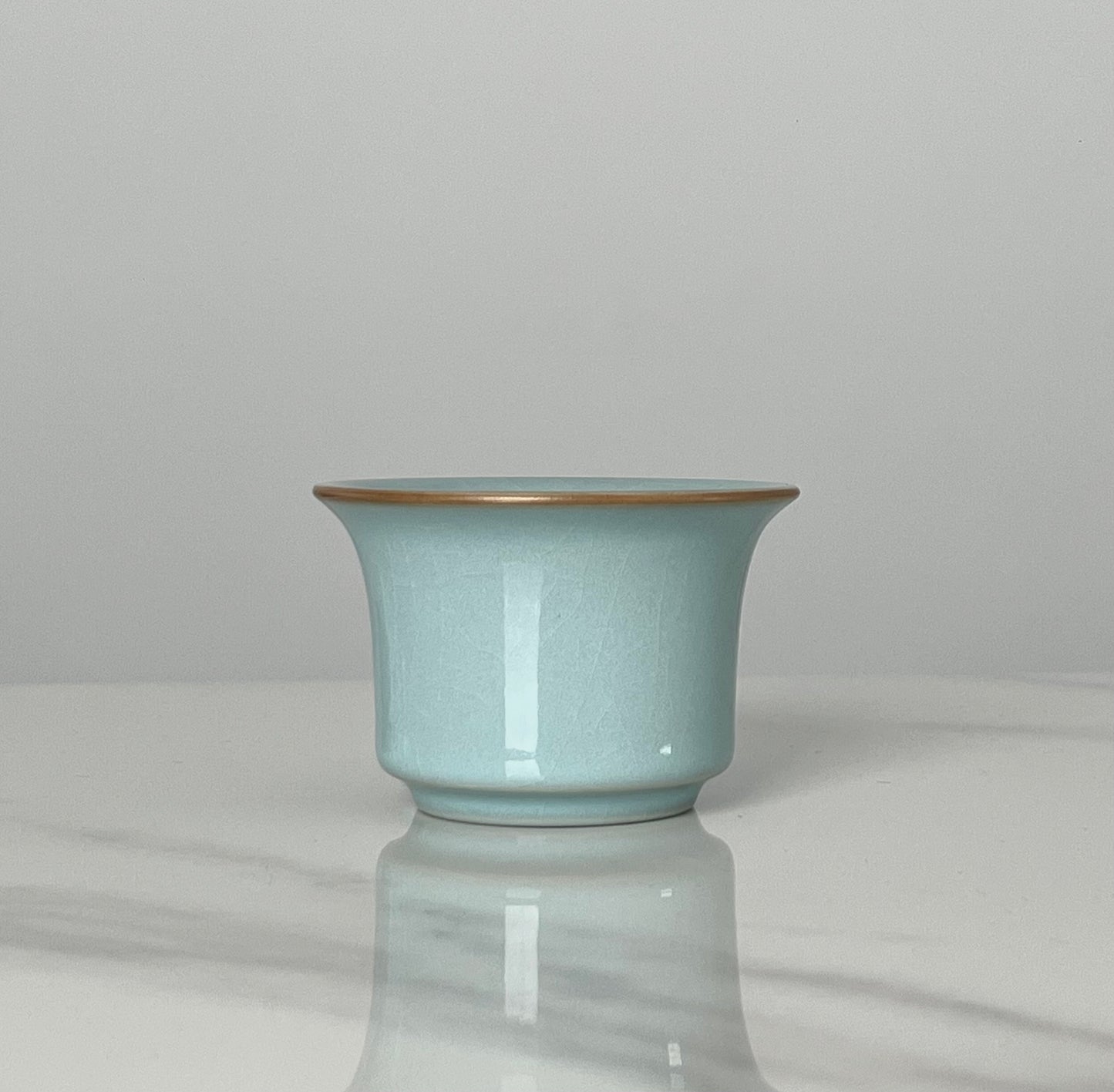 Ru ware tea ceremony cup embodying Song dynasty minimalist aesthetics and meditative tea practice
