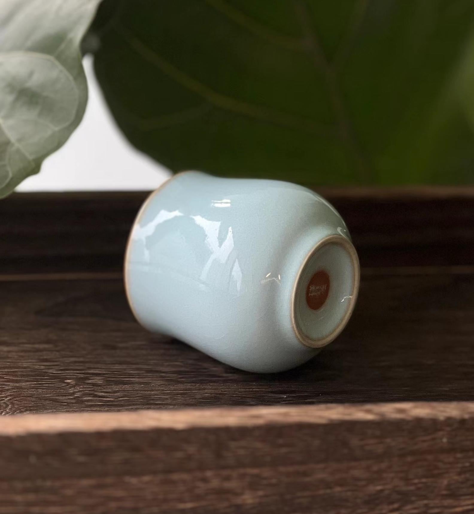 Song dynasty tea aesthetics embodied in Ru ware's minimalist form and tranquil glaze
