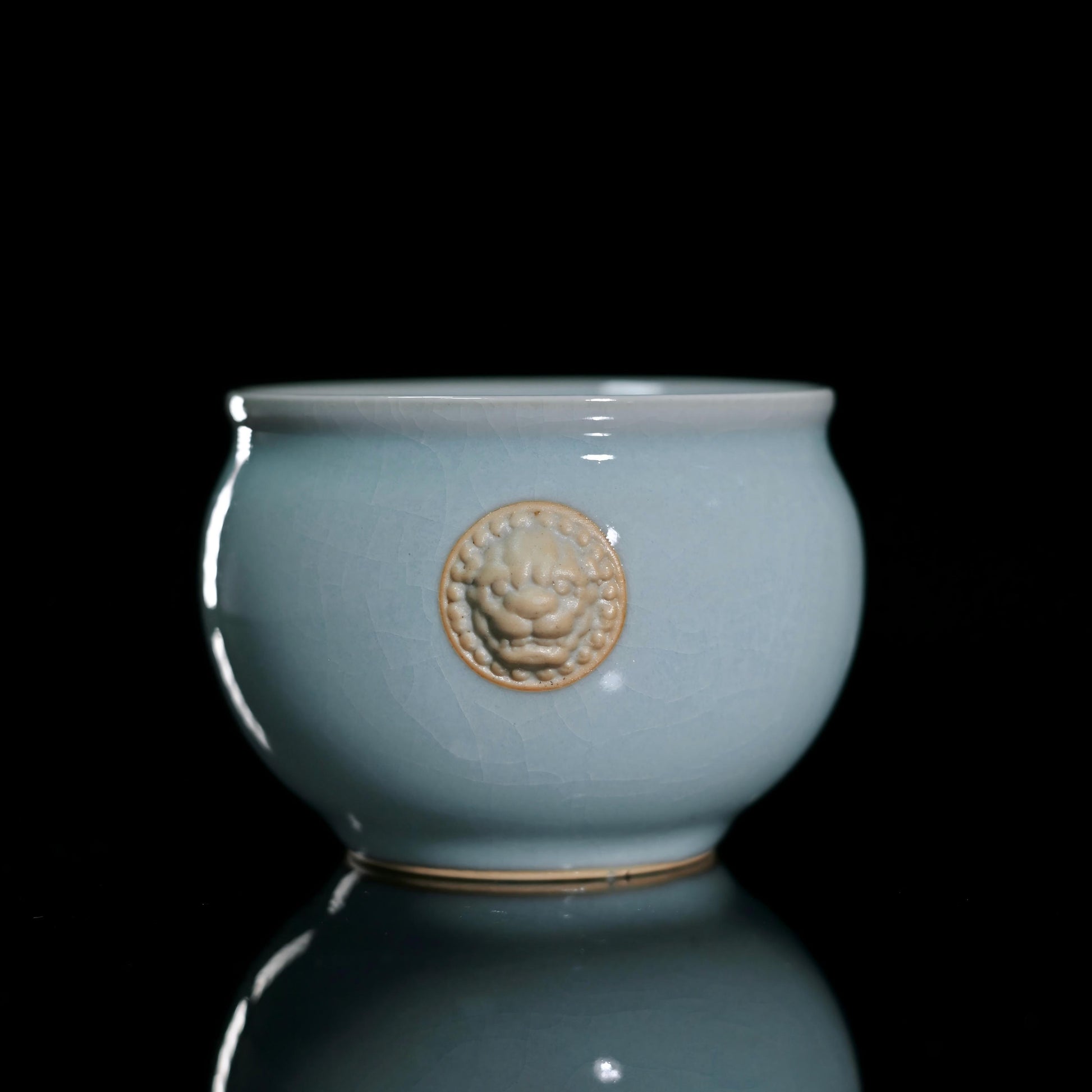 Ru ware sky-blue tiger head master cup with hand-pinched tiger sculptures on opposite sides of barrel form