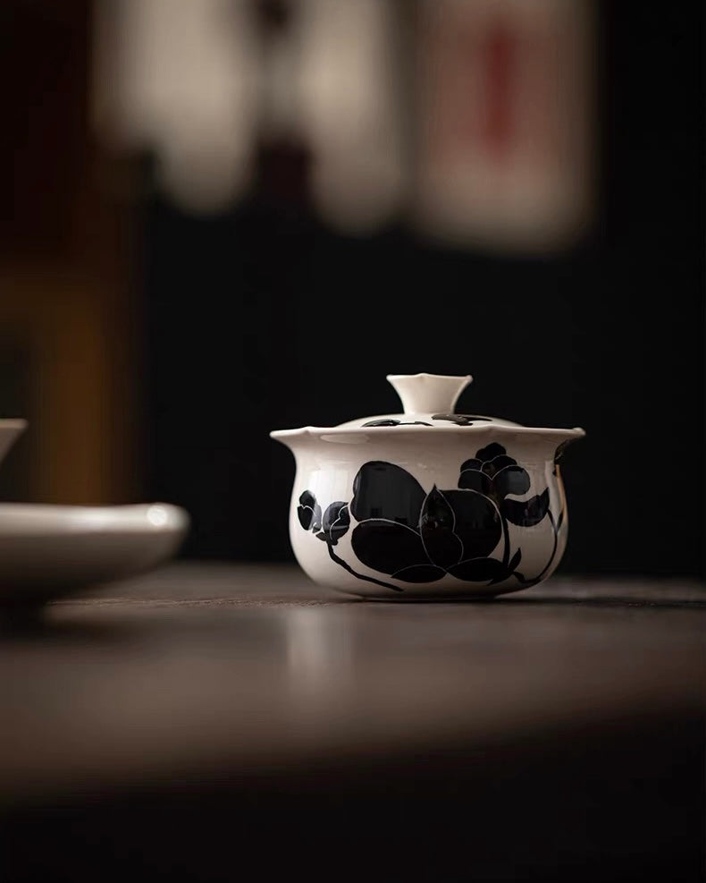 Rustic ash glaze tea set piece with magnolia decoration, suitable for both beginner and experienced tea enthusiasts