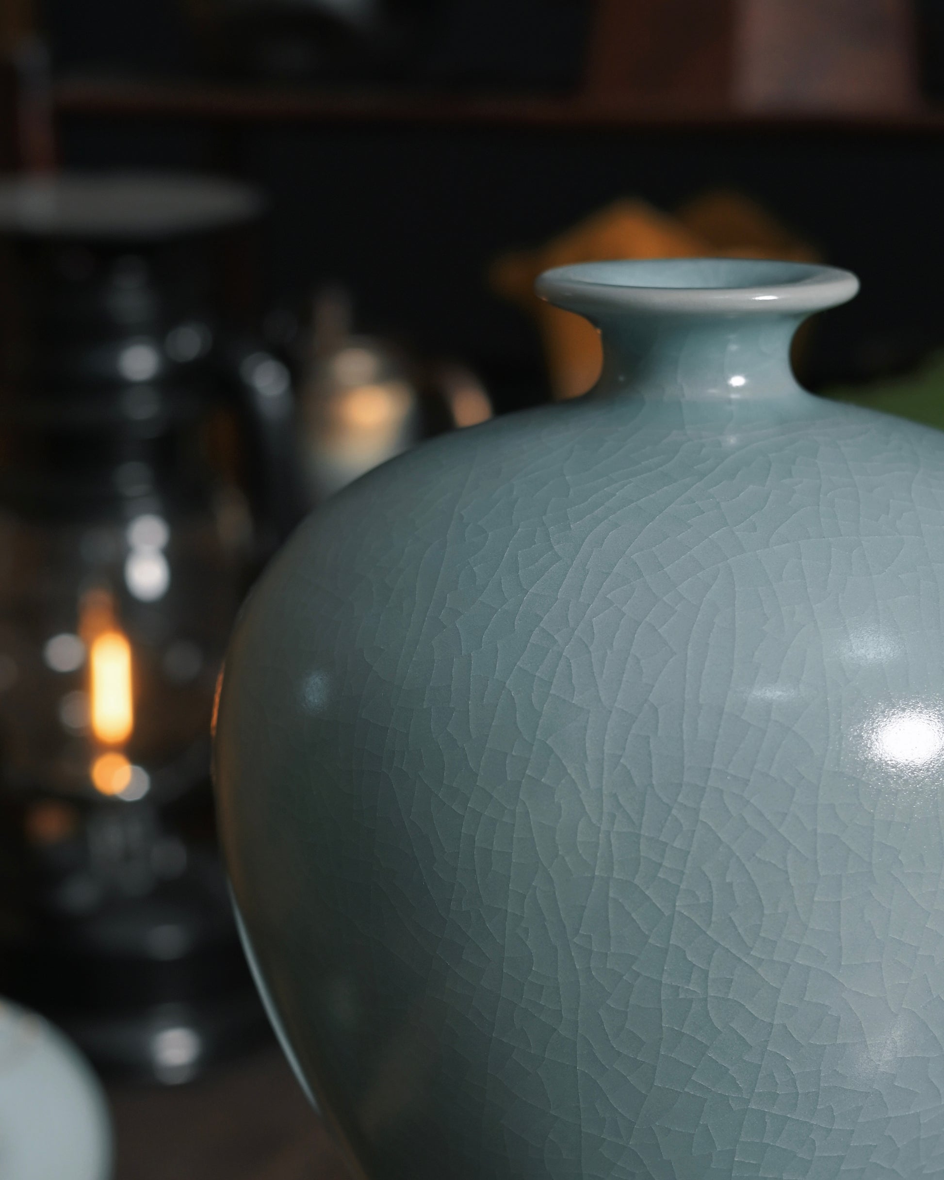 Delicate cicada-wing crackle pattern naturally formed during traditional Ru kiln firing