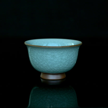 Ru ware ice-crackle teacup featuring natural crackle patterns resembling layered ice fractures