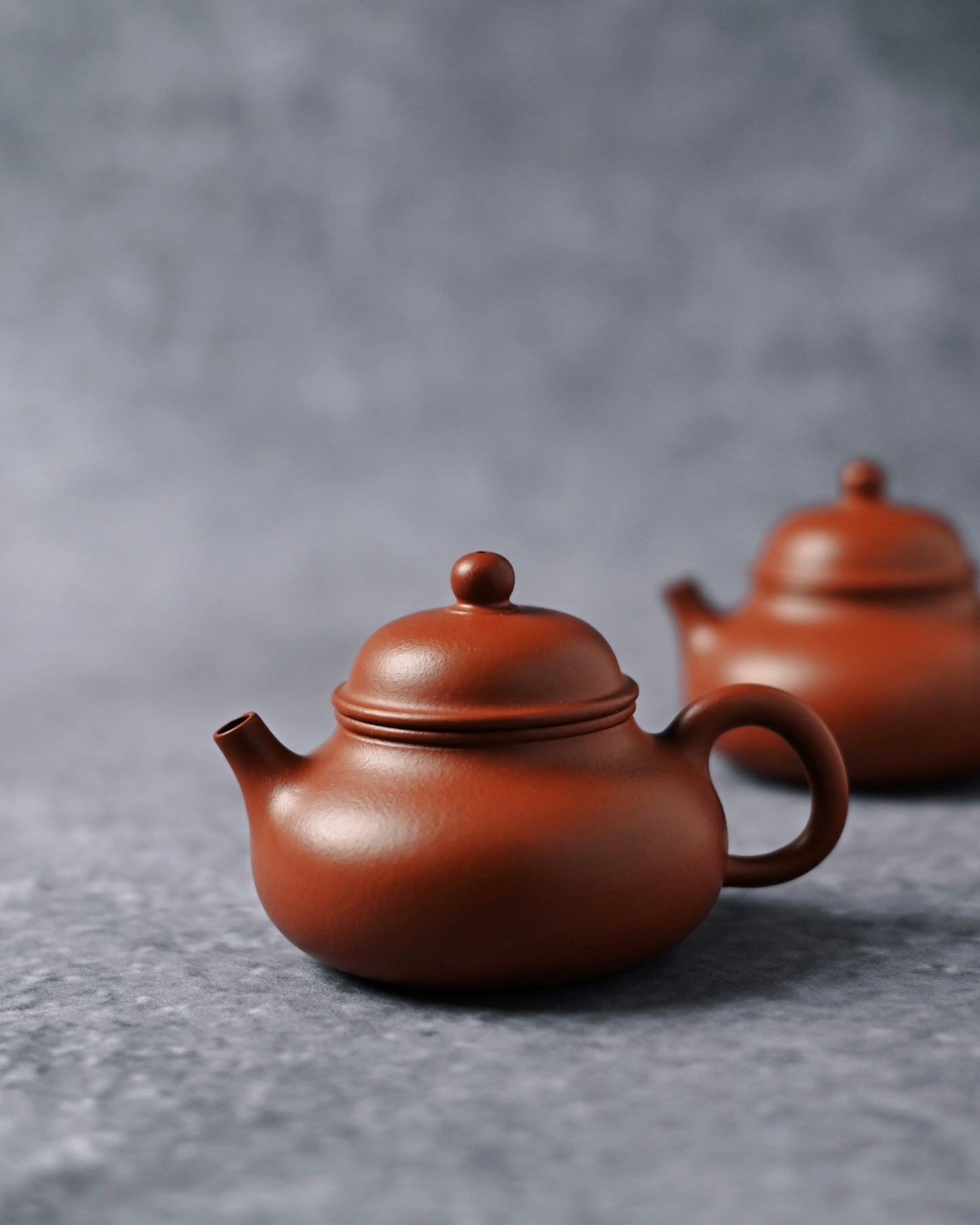 Fully handmade Yixing teapot showing traditional hand-thrown construction and unglazed clay finish