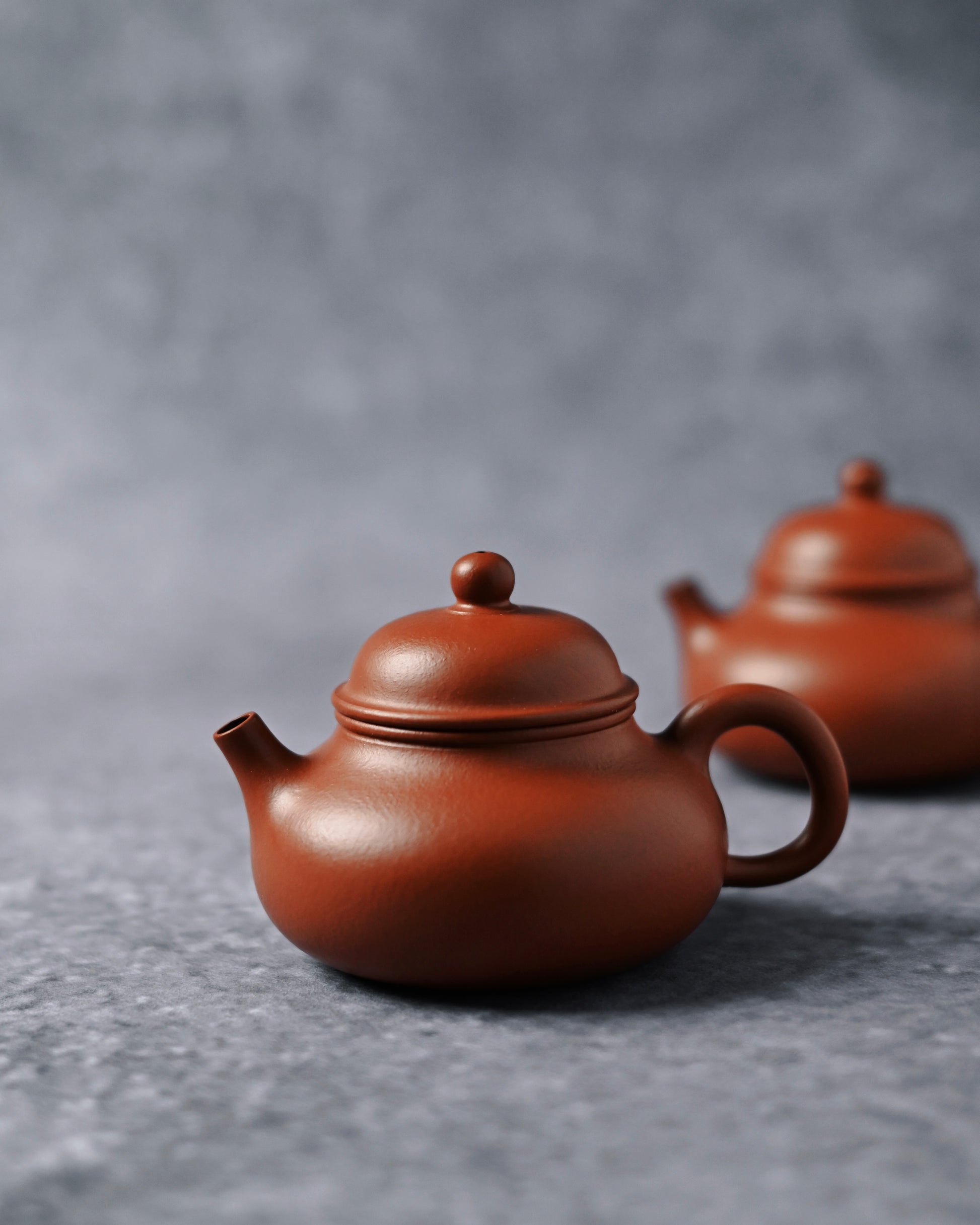 Fully handmade Yixing teapot showing traditional hand-thrown construction and unglazed clay finish