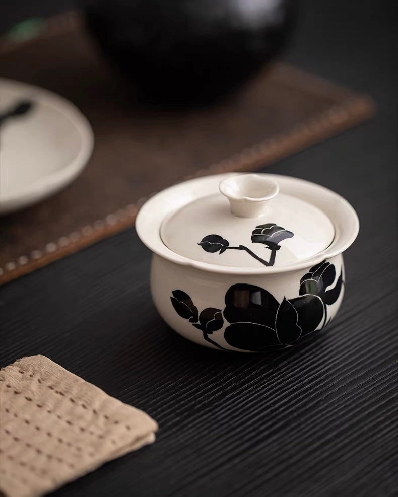 Gaiwan with ash glaze finish, showcasing minimalist magnolia artwork and functional design