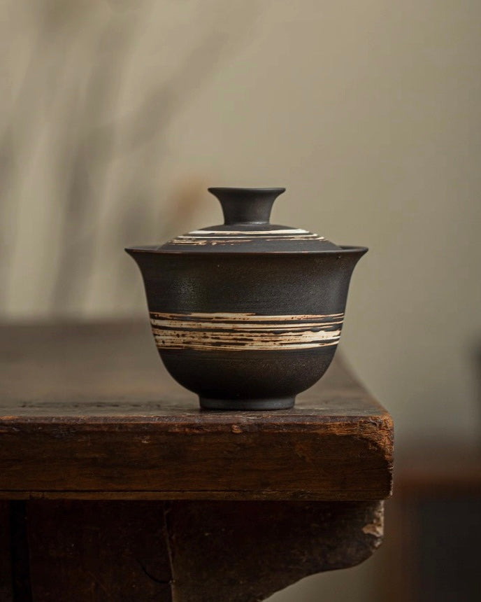 Organic texture tea ware set with rough clay surface, celebrating the beauty of natural materials in tea practice