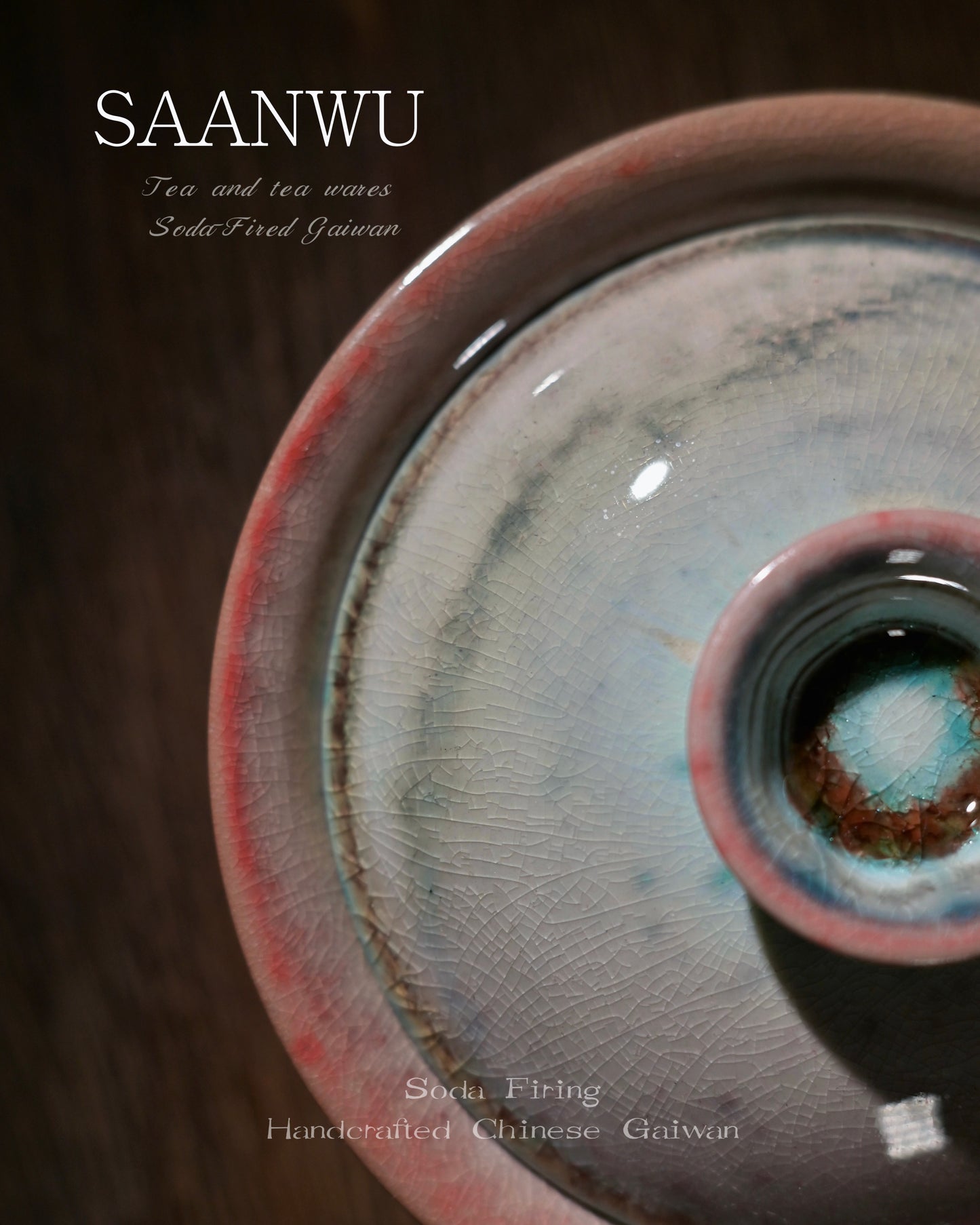 SAANWU blush soda firing gaiwan with lid aside on dark wood table, inner flower crystal glaze, aesthetic tea room decor