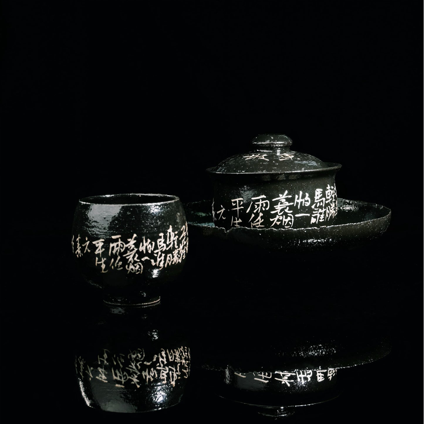 Saanwu Wabi-sabi style ceramic tea set with glossy black glaze, silver calligraphy and pine tree design