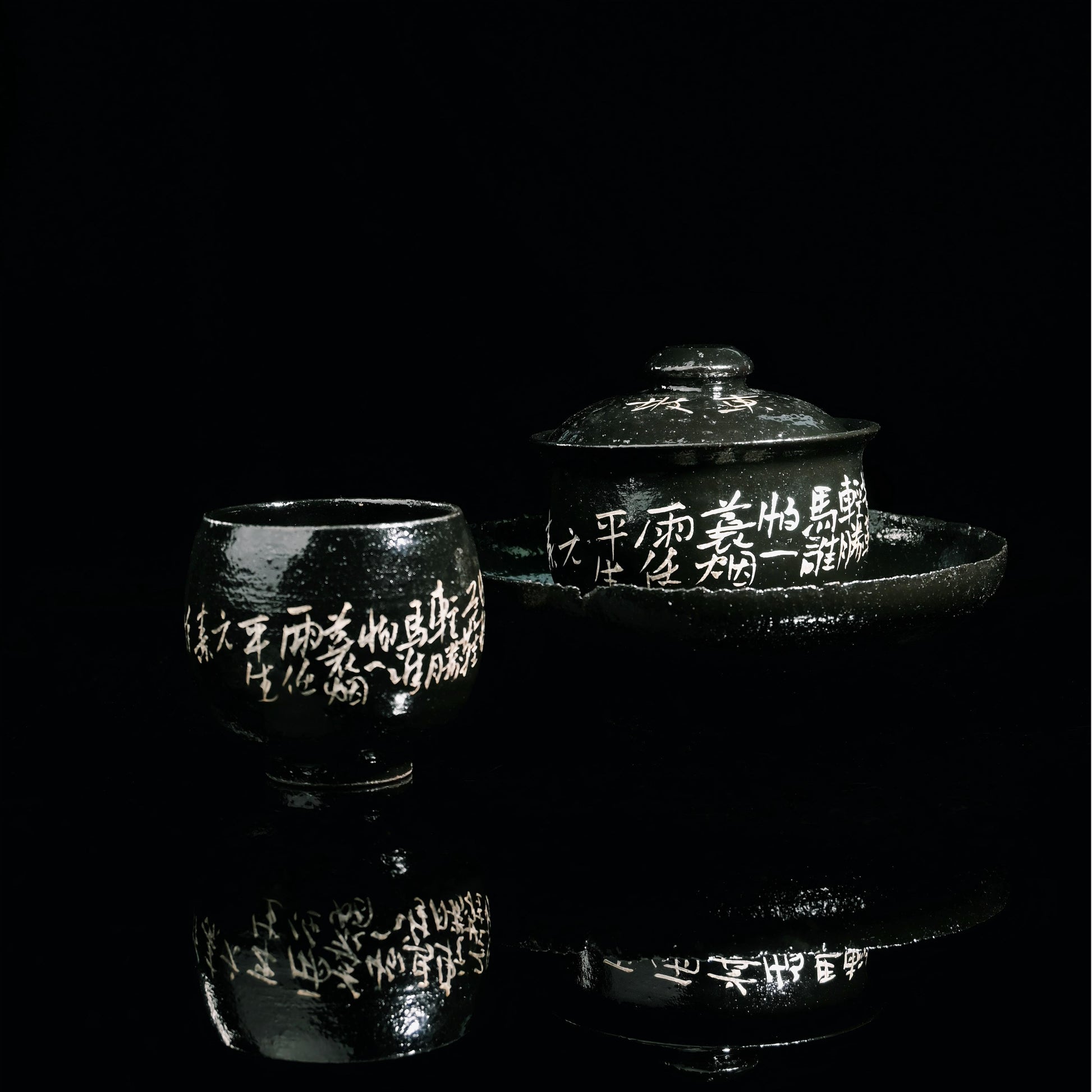 Saanwu Wabi-sabi style ceramic tea set with glossy black glaze, silver calligraphy and pine tree design