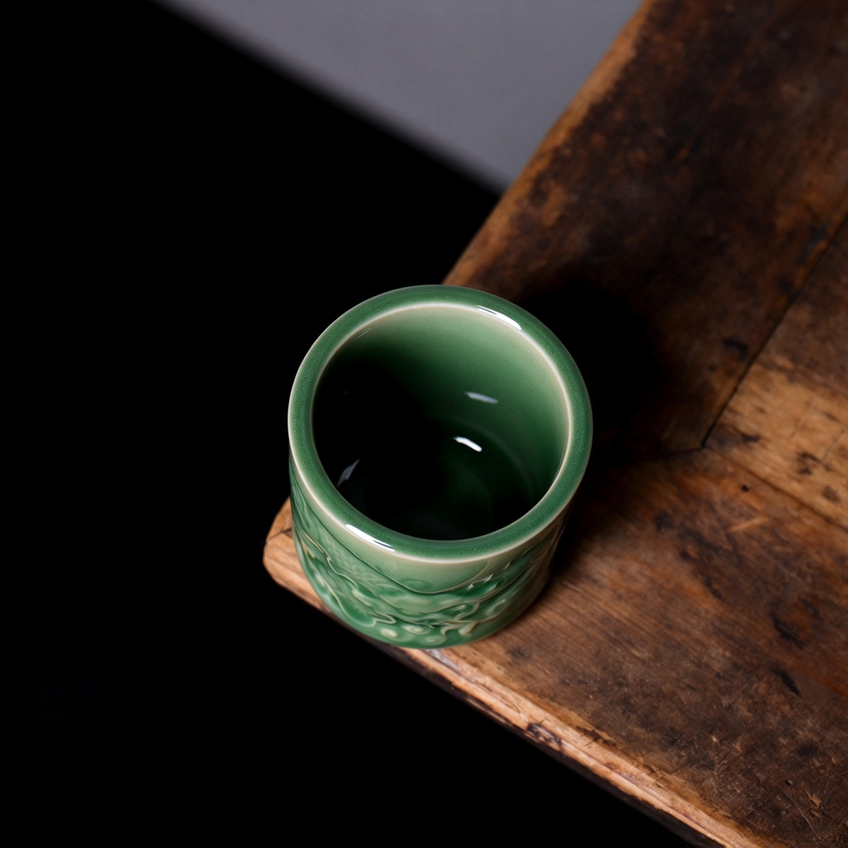 Top view of Longquan Celadon dragon teacup showing smooth porcelain interior and rim