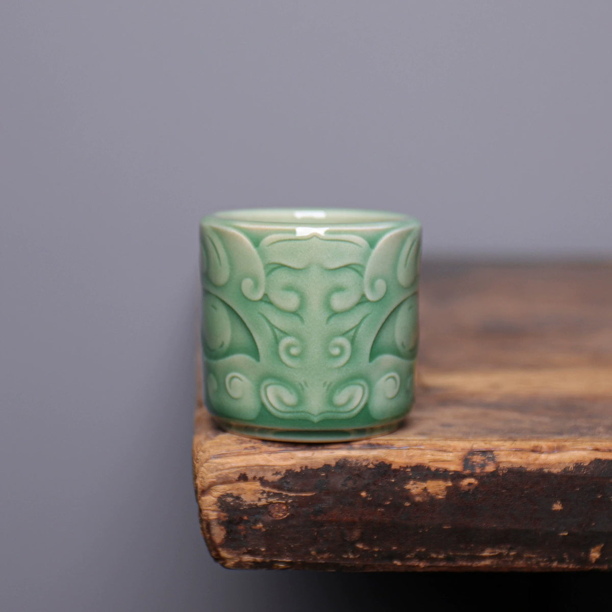 Top view of Longquan Celadon Taotie mask teacup showing smooth porcelain interior and rim