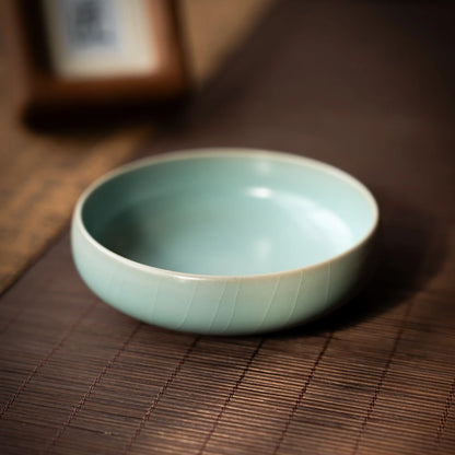 Interior detail of Ru Ware large cup showing smooth glaze and elegant willow leaf design