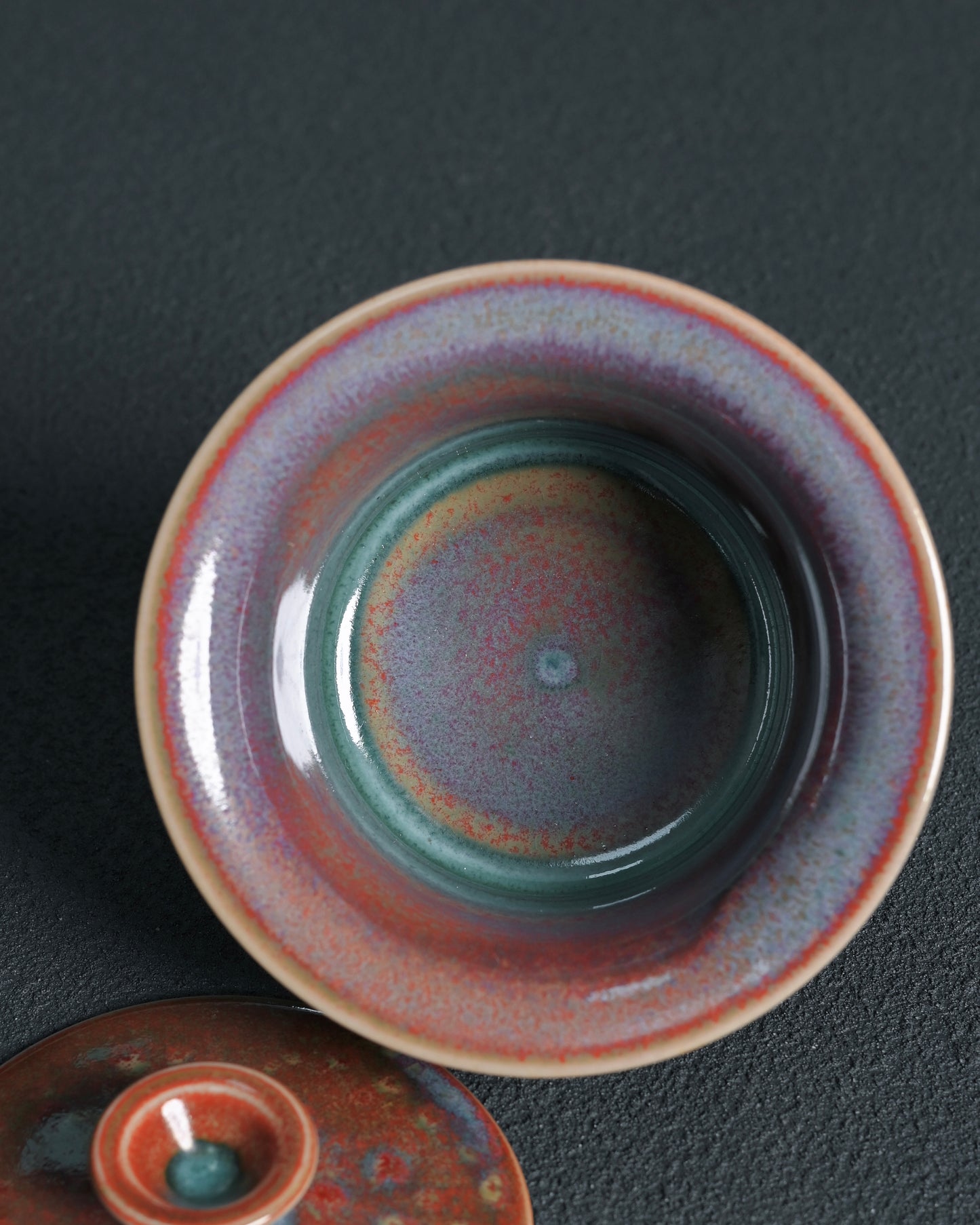 Jun ceramic showcasing natural flame effects and atmospheric glaze development