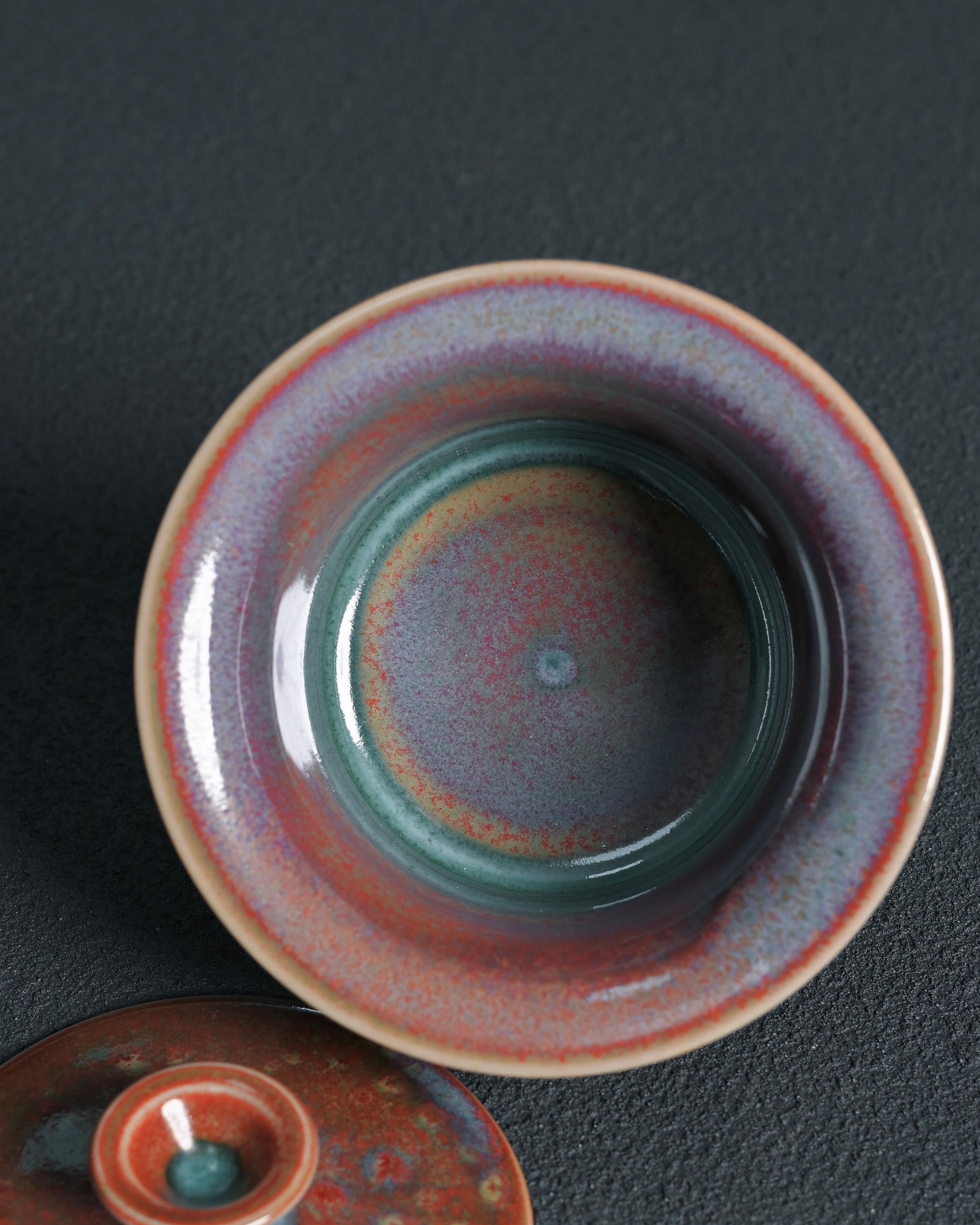 Jun ceramic showcasing natural flame effects and atmospheric glaze development