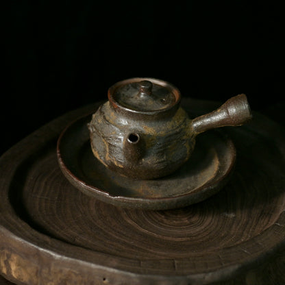 Side-handle Gongfu teapot designed for precise pouring in traditional Chinese tea ceremony practice