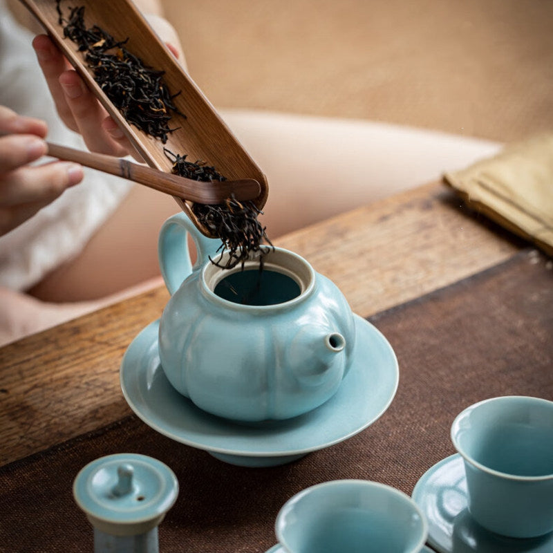 Classical Chinese porcelain pumpkin teapot in sky-blue glaze built for multi-guest tea tasting
