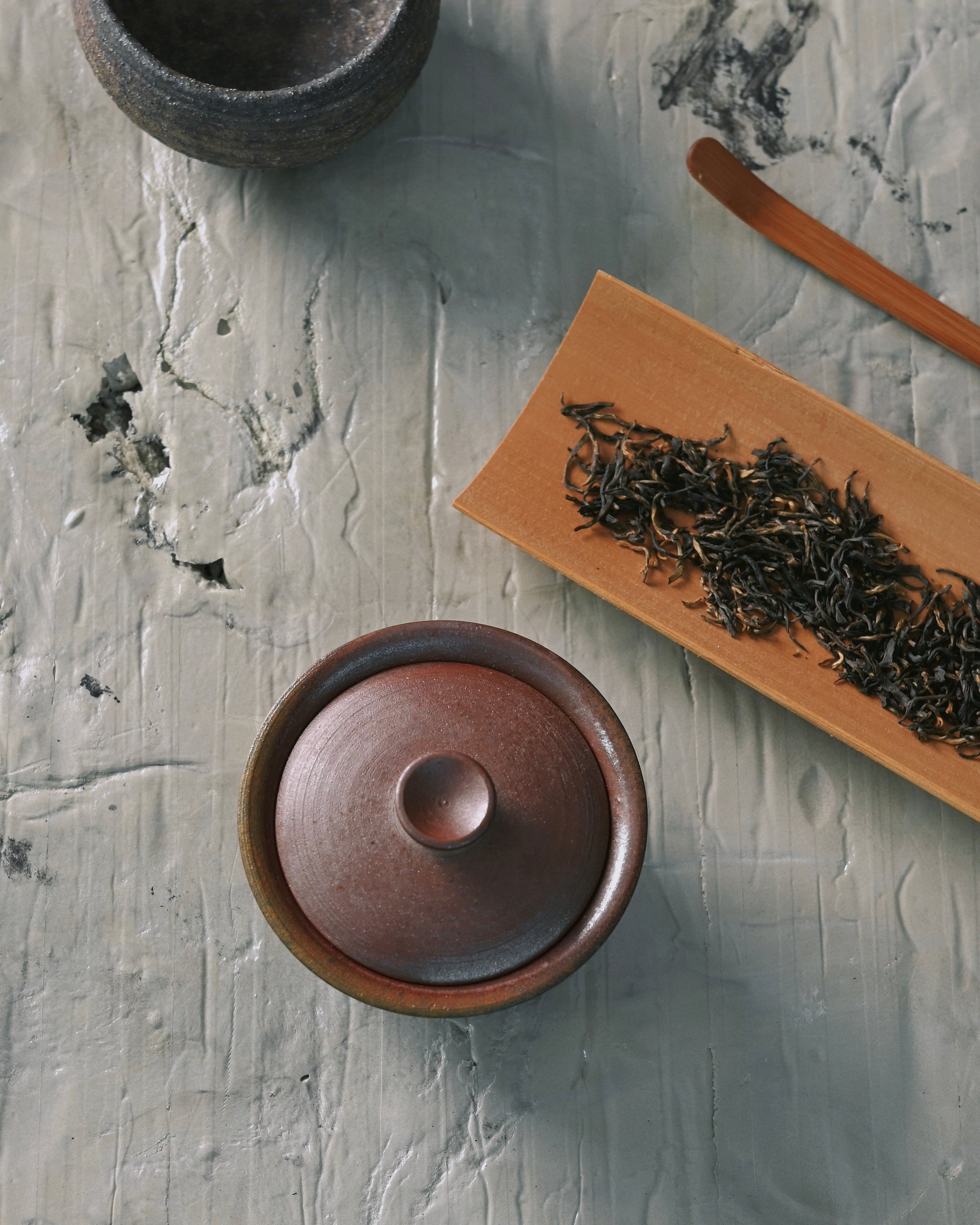 Exceptionally smooth ceramic surface texture demonstrating advanced clay preparation and firing technique