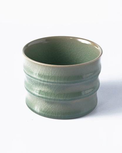 Song Dynasty style Ru celadon master cup with bamboo-inspired form and intricate crackle network patterns