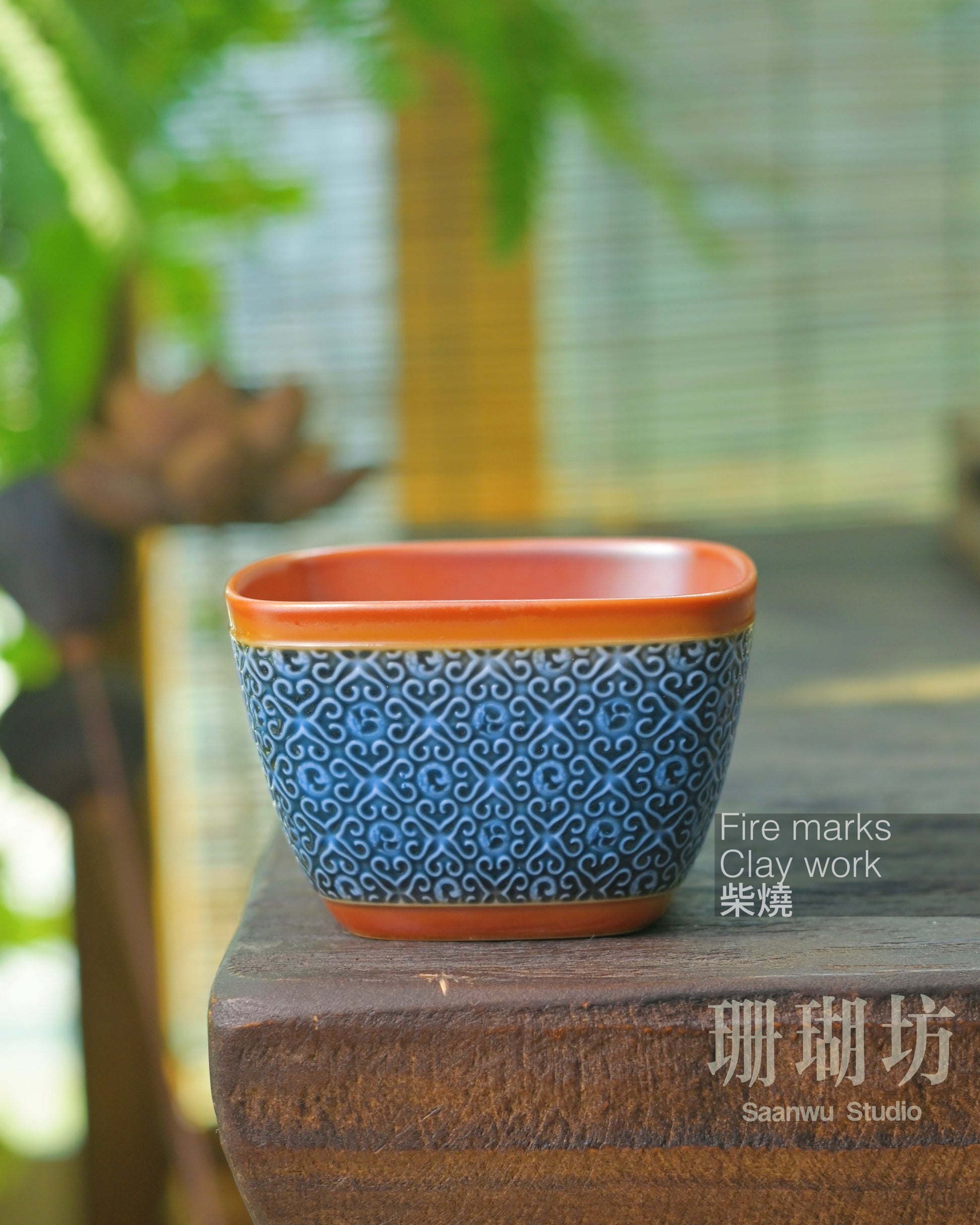 Porcelain clay cup fired in wood kiln achieving refined smooth texture