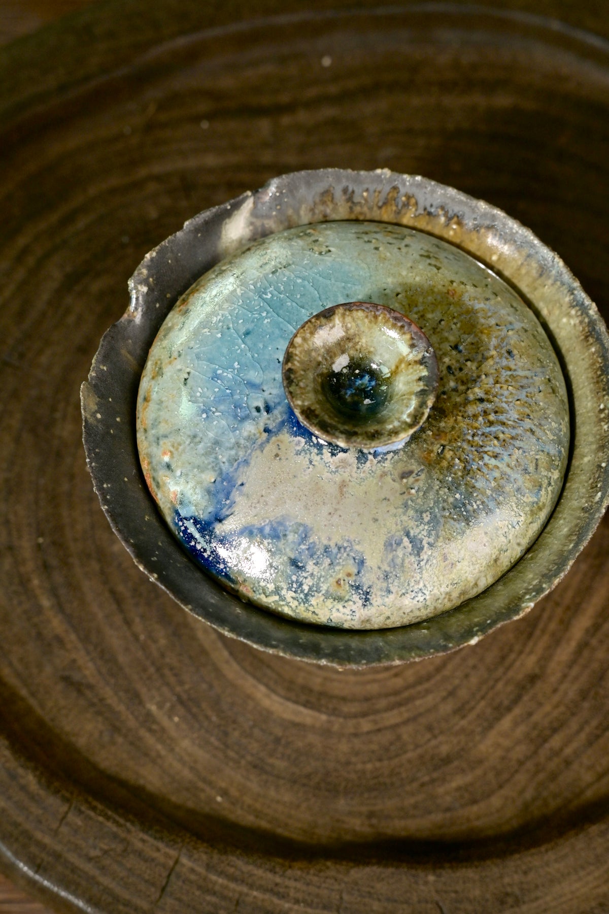 Close-up of natural fly ash dripping glaze and organic Wabi-sabi rim on 150ml coarse stoneware gaiwan