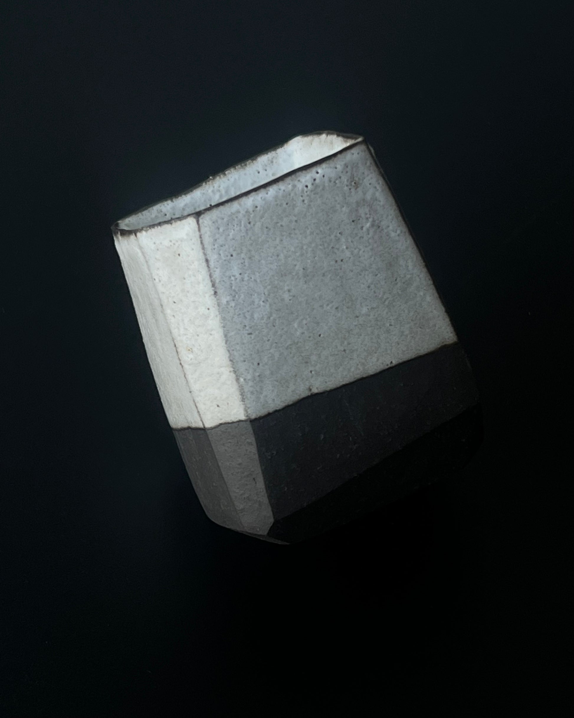 Natural tea patina formation process within the porous slip-finished interior