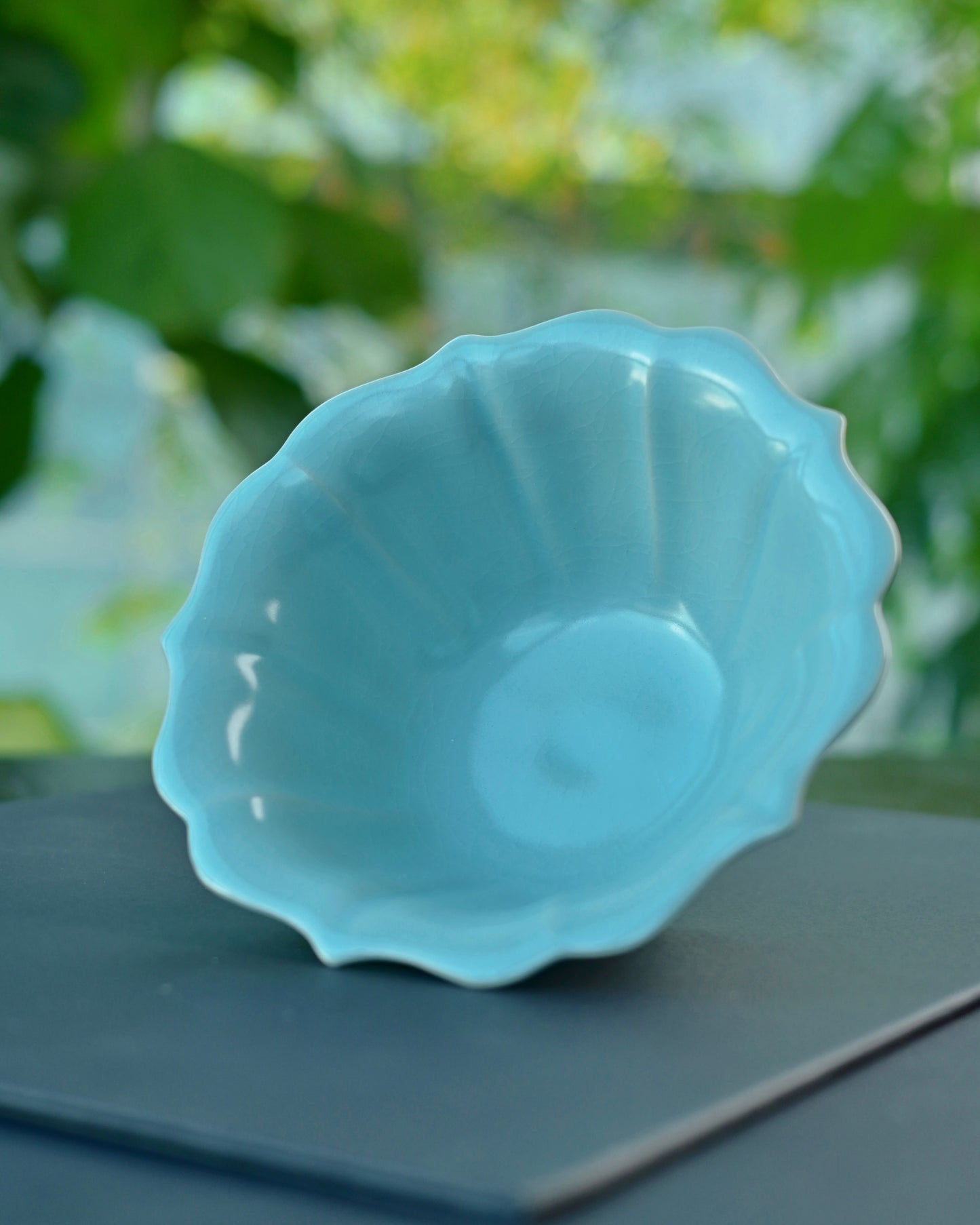 Tea-stained crackle evolution showing how use develops golden lines in glaze