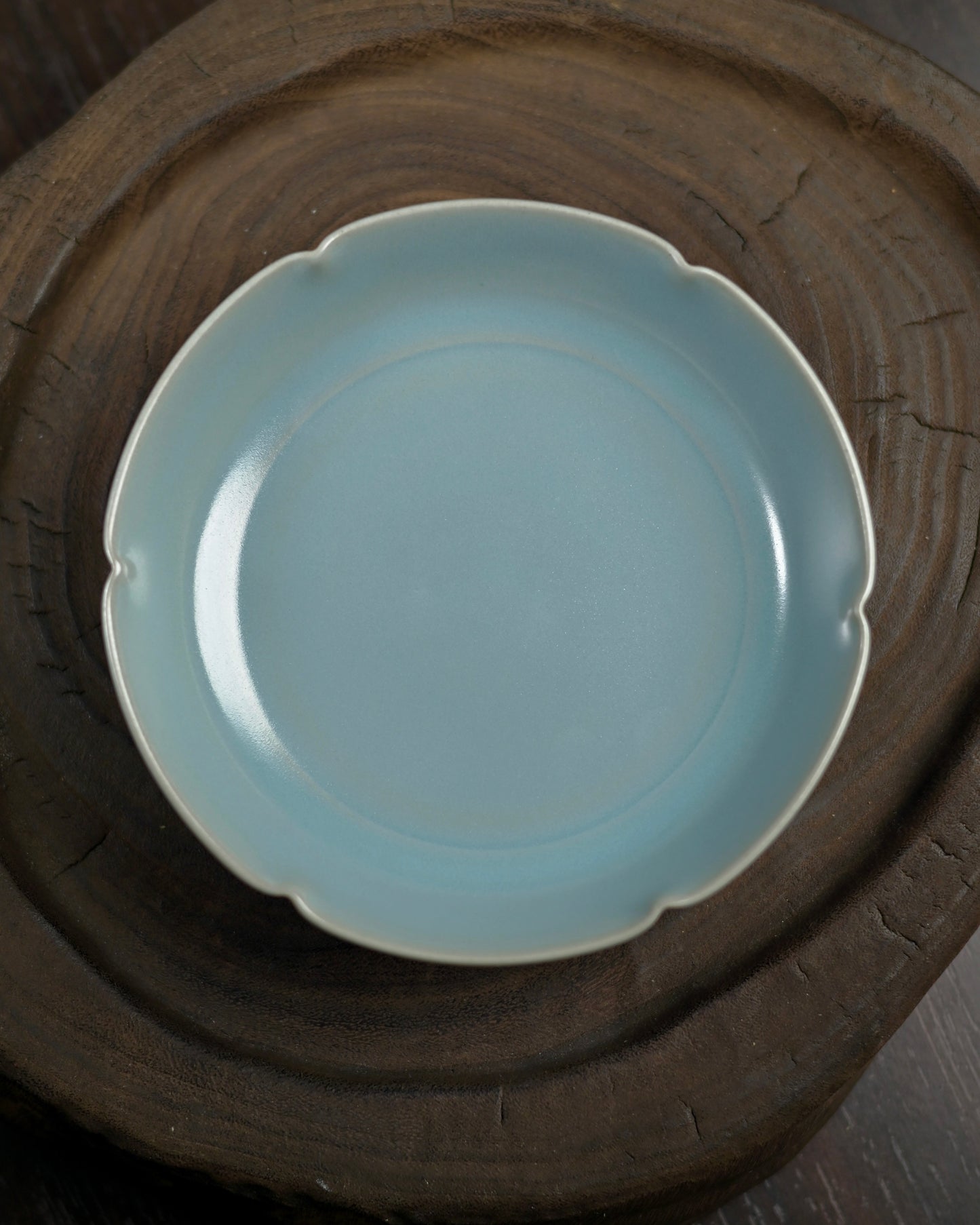 Base detail showing traditional three-point pin-mark firing technique used in authentic Ru ware