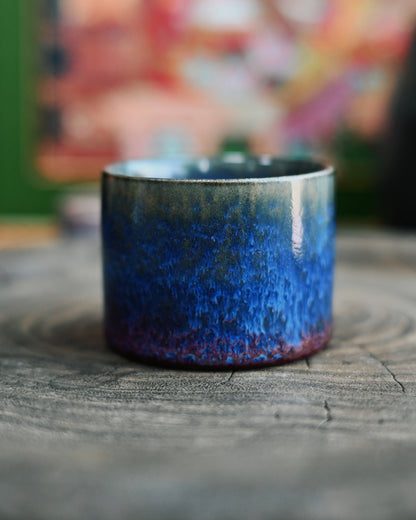 Ergonomic thumb-ring design allowing natural grip for intimate tea drinking experiences