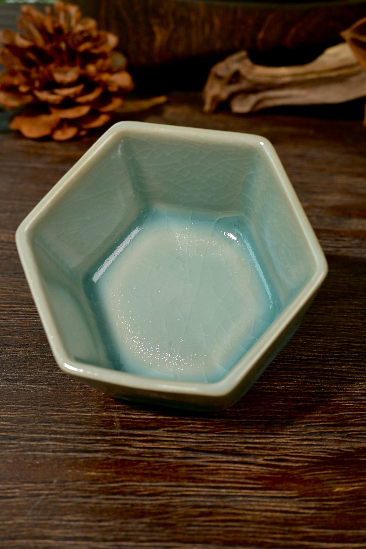 Top-down view of hexagonal Ru kiln sky-blue teacup showing six-sided rim and smooth interior