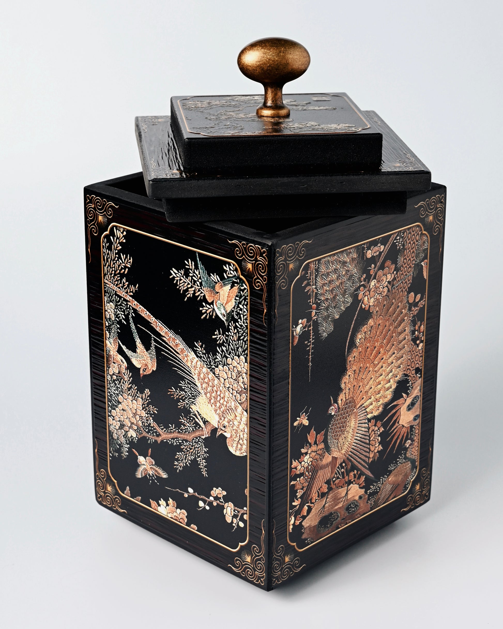 Antique-style tea container made from bamboo charcoal, displaying prosperous scene from Chinese mythology