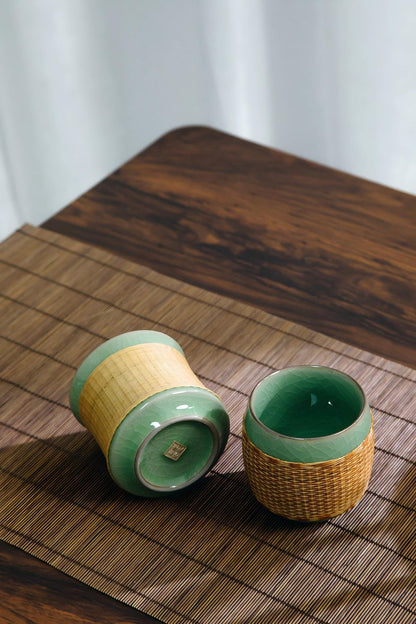 Two‑model collection of Longquan Ge‑Yao celadon teacups with hand‑woven bamboo sleeves: bamboo‑joint and Yuanrong styles