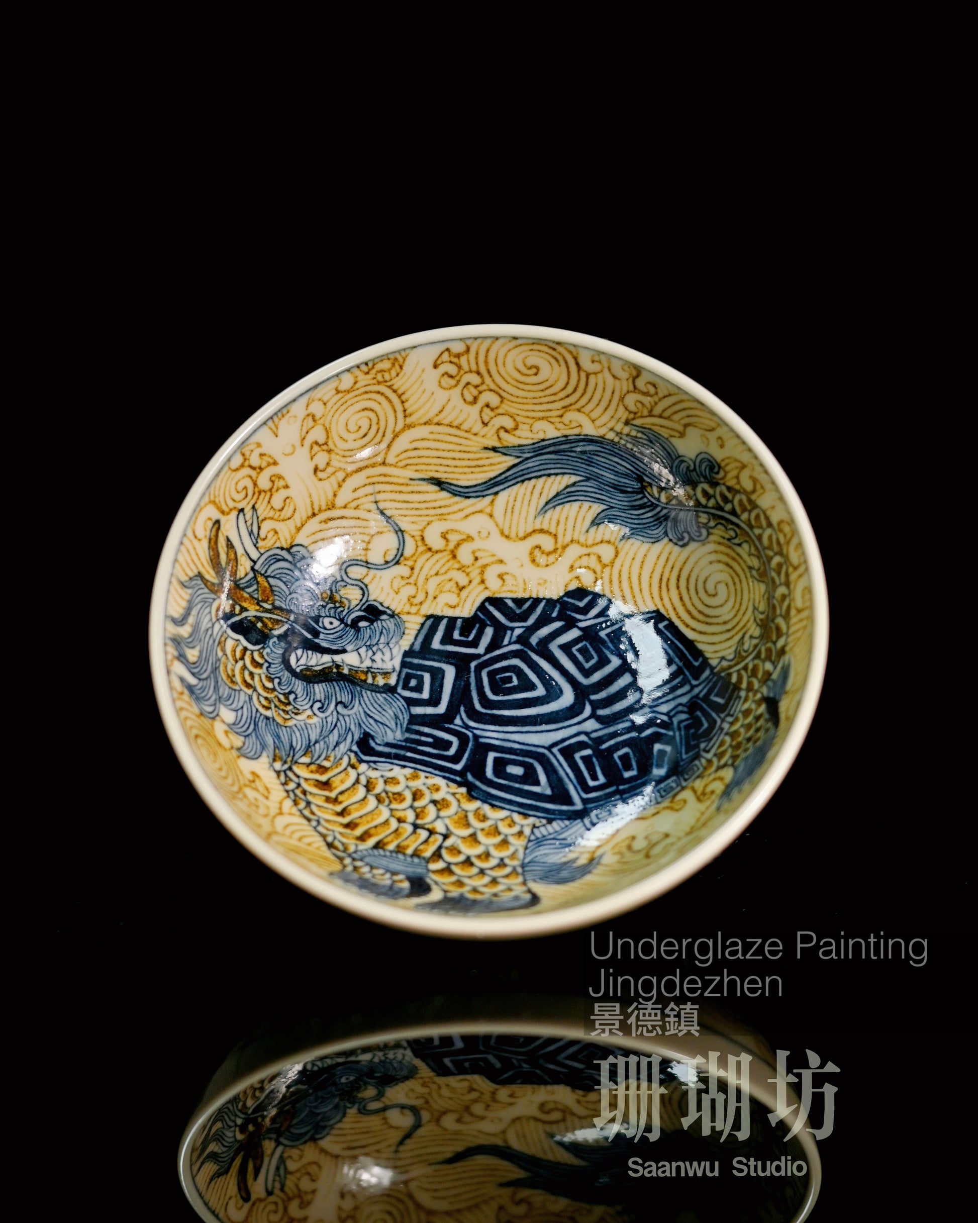 Underglaze gold Bixia motif showing dragon head and turtle body symbolizing strength and stability