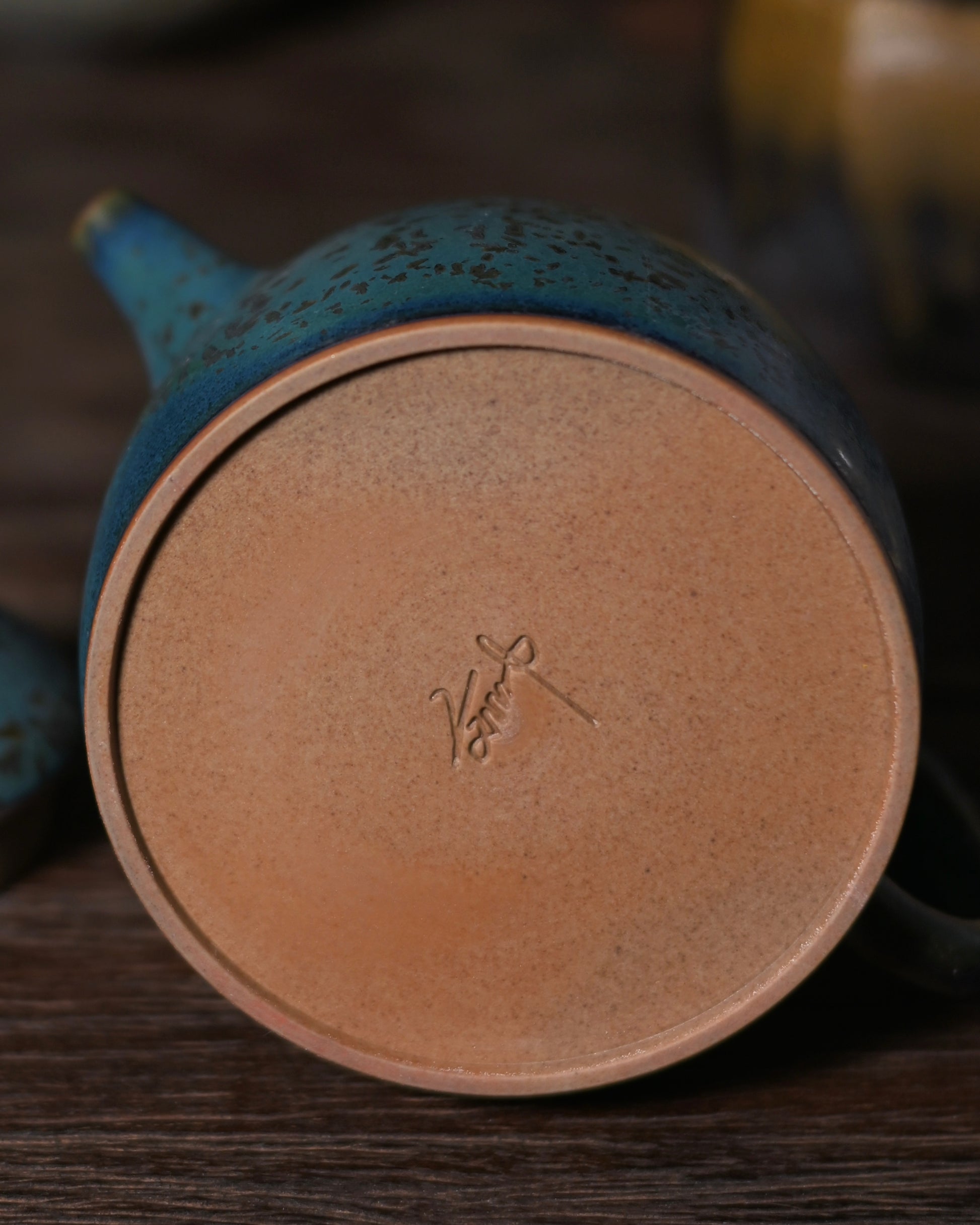 Unglazed incense-ash grey clay interior revealing natural Jun body that breathes and develops patina with use