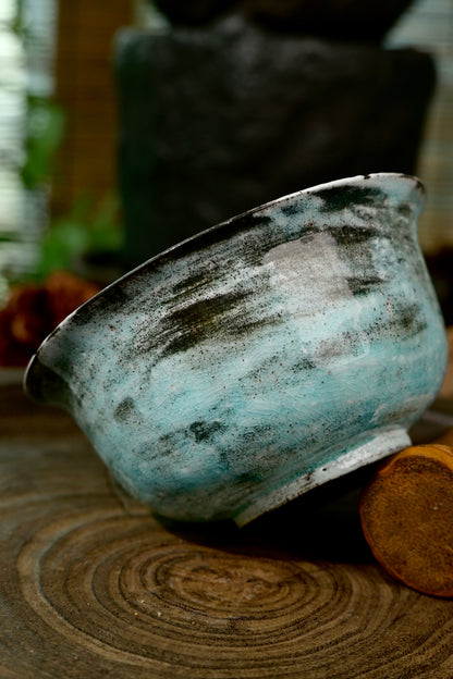 Hand-thrown Kohiki style blue gaiwan featuring organic soda ash speckles and flame marks