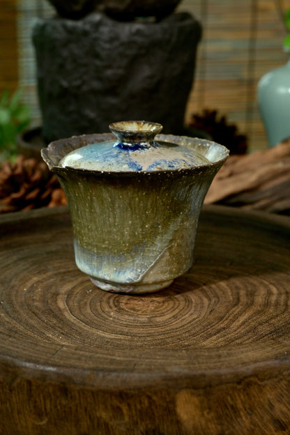 150ml wood-fired coarse clay gaiwan showcasing dramatic drip glaze melt and mineral specks