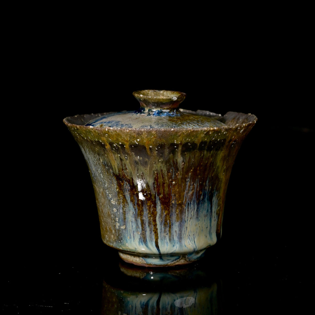 Unique handcrafted wood-fired coarse stoneware gaiwan 150ml with natural ash drip glaze on rustic wood stump