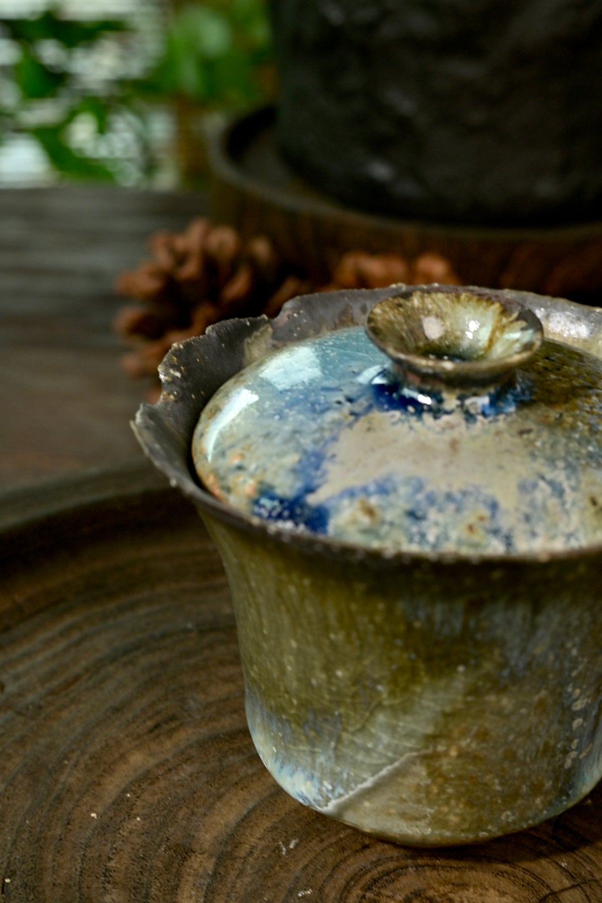 Unique Wabi-sabi stoneware gaiwan 150ml with natural wood flame marks on dark wood tea board