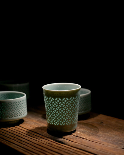Vintage Chinese ceramic linglong celadon tea cup, millennia-old Longquan jade glaze hollow perforated art tea ware
