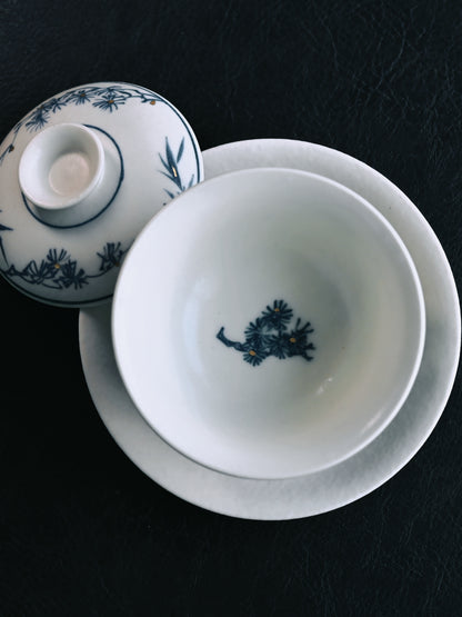 Jingdezhen fully handmade blue and white matte glaze gaiwan with hand-painted pine tree design, three-part 'Sancai' style, crafted from premium kaolin clay.