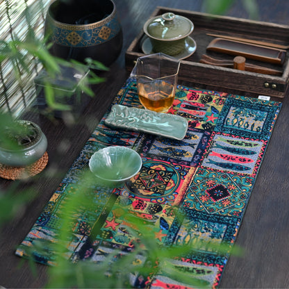 Traditional fish pattern tea mat symbolizing abundance, crafted from absorbent cotton-linen for practical yet decorative table use.