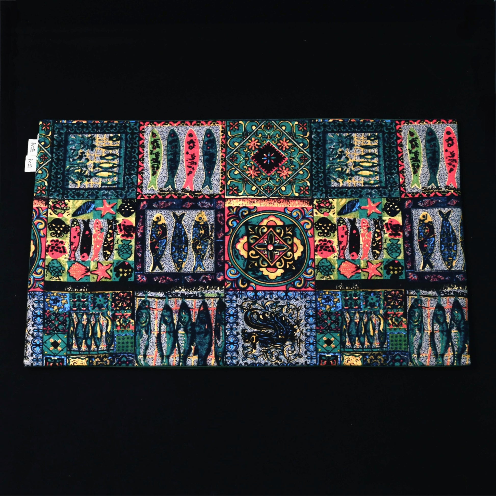 Highly absorbent retro tablecloth with fish pattern, perfect for protecting surfaces while adding decorative charm to tea settings