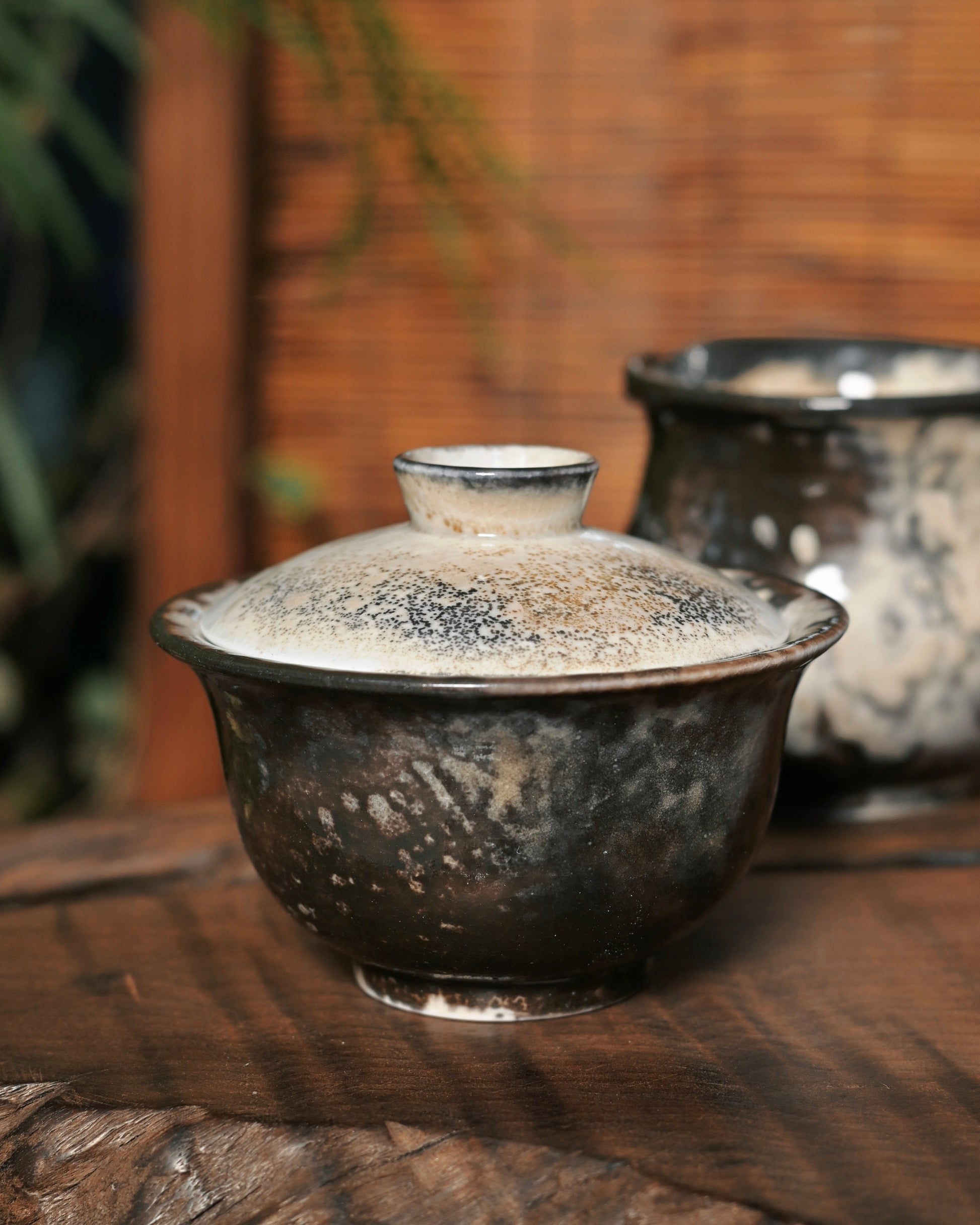 Vintage wood-kiln ceramic demonstrating ancient firing techniques preserved in contemporary craft
