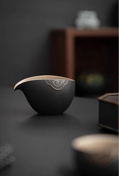 A fairness cup, known as gongdao bei in Chinese, is a vessel used to ensure equal distribution of tea—in strength, color, and temperature—among all guests before serving.