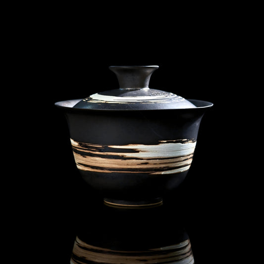 Wabi-sabi slipware gaiwan set for Japanese tea ceremony, featuring raw clay texture and minimalist aesthetic