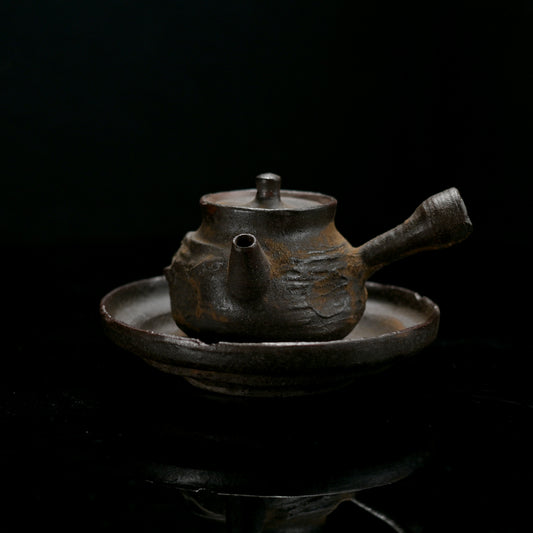 Wabi-sabi style wood-fired tea set featuring coarse clay construction and natural rustic textures