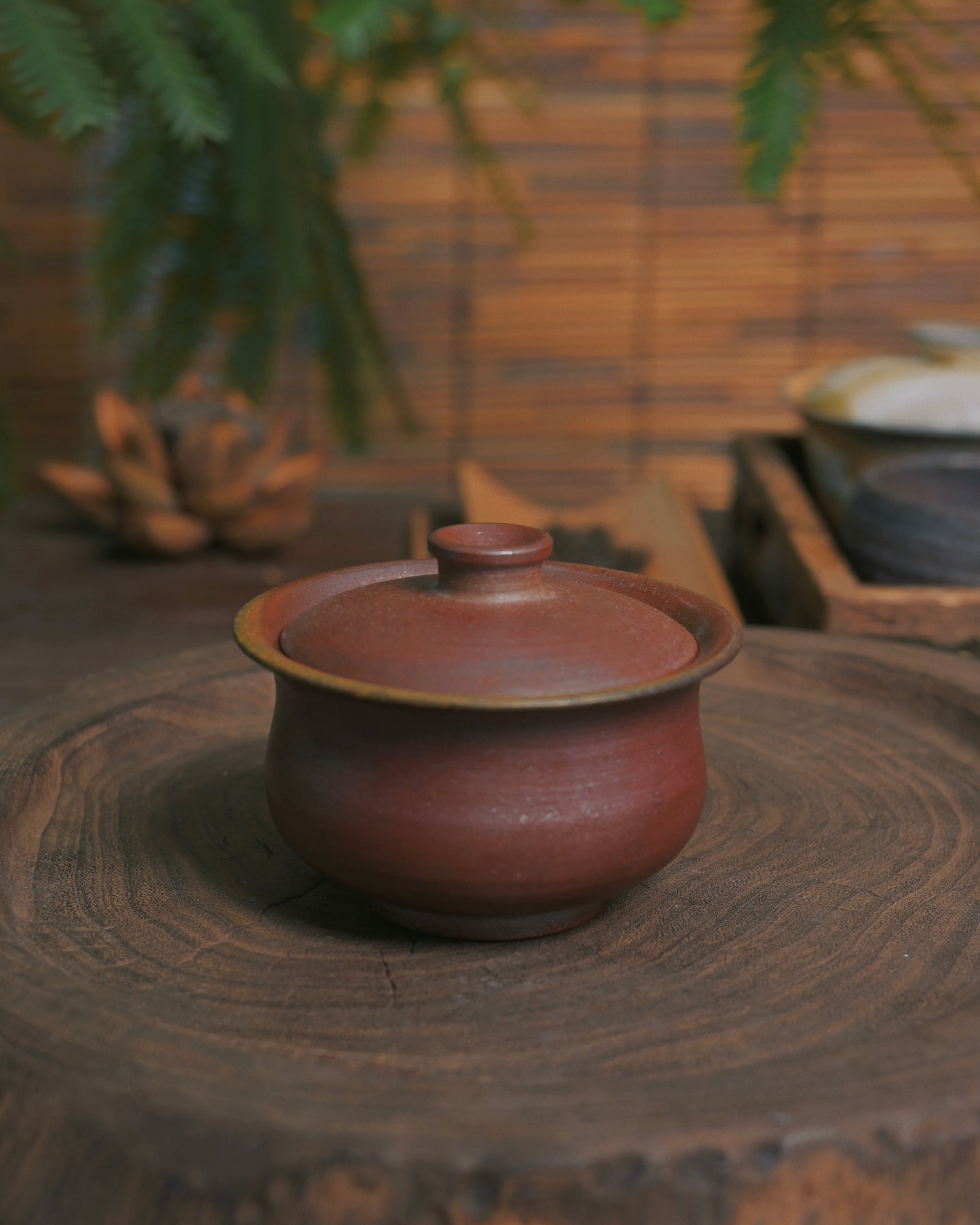 Hand-shaped tea vessel representing harmony between artisan craftsmanship and natural material response